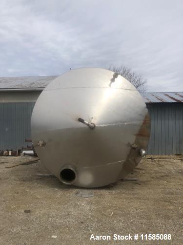 Used-Approximately 12000 Gallon Vertical Stainless Steel Tank