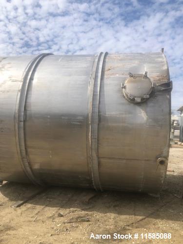 Used-Approximately 12000 Gallon Vertical Stainless Steel Tank