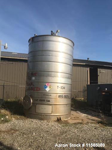 Used-Approximately 10000 Gallon Vertical Stainless Steel Tank