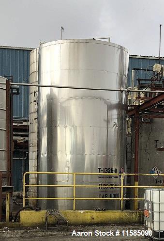 Used-Approximately 11000 Gallon Vertical Stainless Steel Tank