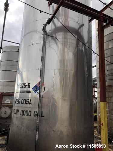 Used-Approximately 11000 Gallon Vertical Stainless Steel Tank