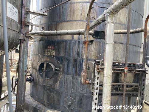 Used-Approximately 21,500 Gallon Vertical Stainless Steel Tank