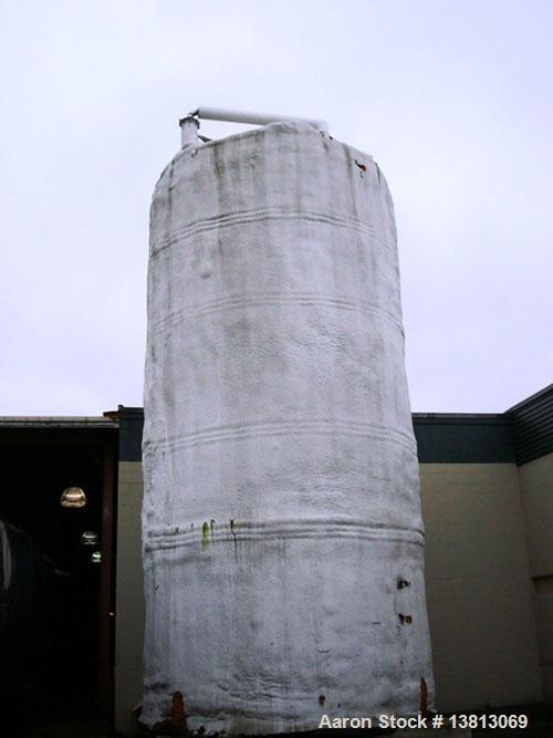 Used-20,000 Gallon Stainless Steel Storage Tank. Flat top and bottom, side discharge. Approximately 12' in diameter x 25' ov...