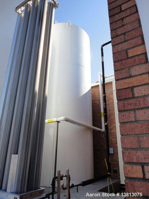 Used 20,000 Gallon Jacketed Silo, mild steel exterior and stainless steel interior. Jacket coils are located in the bottom 1/3 of the tank. 7 1/2 hp, 240/480V, 60 hz. Agitator mounted at bottom side ...