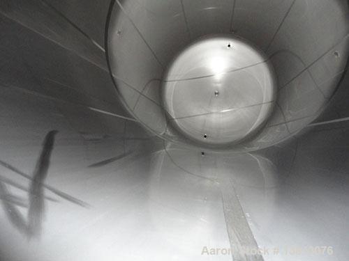 Used 20,000 Gallon Jacketed Silo, mild steel exterior and stainless steel interior. Jacket coils are located in the bottom 1/3 of the tank. 7 1/2 hp, 240/480V, 60 hz. Agitator mounted at bottom side ...