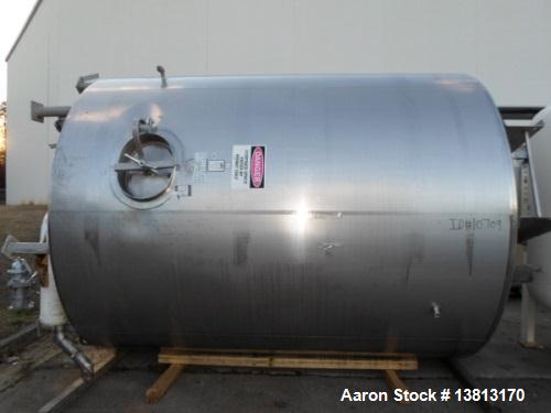 Used 5000 Gallon Jacketed SFI Stainless Steel Storage Tank. 10' diameter, 11 1/2' straight wall. Top agitated with 5 hp 3/60/240/480V motor, 1680 RPM.