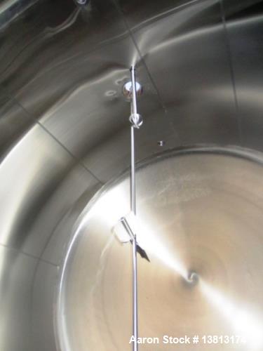 Used 5,000 Gallon Mild Steel Exterior/Stainless Steel Tank. Interior previously used to store sweeteners. End manway, sight glass. Overall Dims- 10'3" long x 10'3" wide x 12'2" tall. Tank dims. 10'3"...