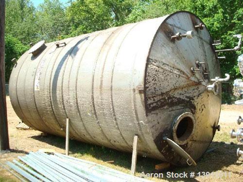 Used-15,000 Gallon Vertical 316 Stainless Steel Storage Tank. 136" diameter x 240" straight side. Tank has internal heating ...