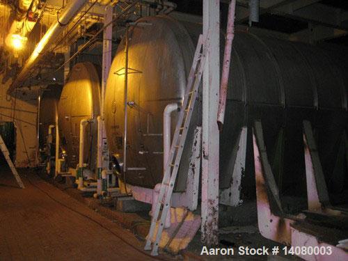 Unused-USED: Tank, 50,330 gallon, 304 stainless steel. 13'3" diameter approximately 48' long. Horizontal on carbon steel cradle frame.Flat horizontal bottom, dished heads. 1/8" wall.