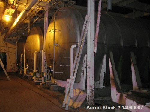 Unused-USED: Tank, 50,330 gallon, 304 stainless steel. 13'3" diameter approximately 48' long. Horizontal on carbon steel cradle frame.Flat horizontal bottom, dished heads. 1/8" wall.