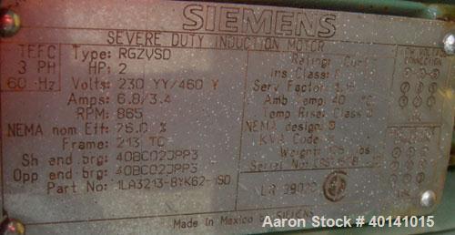 Used: Steel tank and Fabricators tank, 15,000 gallon, 316 L. 1/4" shellL, 12' diameter X 17'6" high, flat top and bottom,  vertical, API standard 650 rating. Top mounted Lightnin agitator, model 15S2...