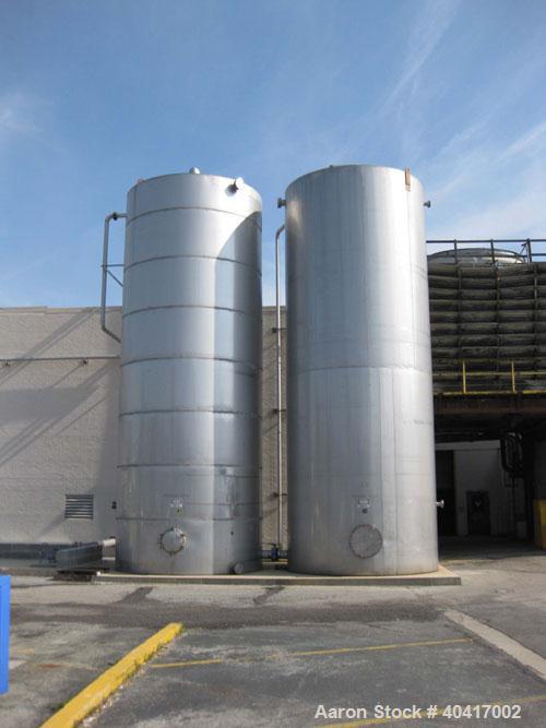 Used-25,000 Gallon 304 Stainless Steel Vertical Storage Tank. Approximate 11' 10" diameter x 30' straight side, flat bottom,...