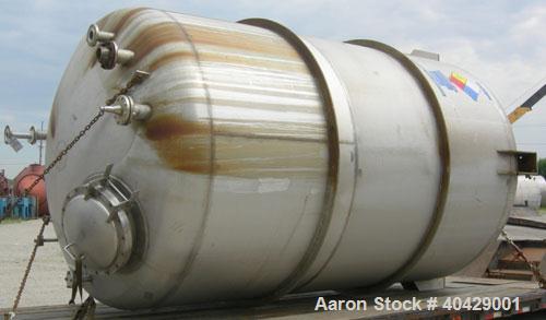 Used Northland Stainless pressure tank, 6500 gallon, 316 stainless steel, vertical. 107 3/8" diameter x 13' straight side, dished top and bottom. Internal rated FV and 40 psi at 200 deg F. Openings: ...