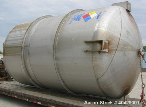 Used Northland Stainless pressure tank, 6500 gallon, 316 stainless steel, vertical. 107 3/8" diameter x 13' straight side, dished top and bottom. Internal rated FV and 40 psi at 200 deg F. Openings: ...