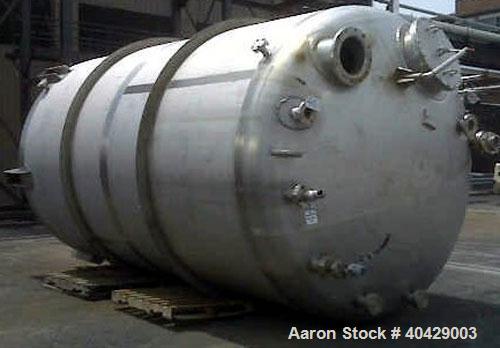 Used Northland Stainless 9000 gallon stainless steel tank. Approximately 116" diameter X 16' straight side. Dished heads. Internal rated 14.9 PSI/full vacuum @ 400 deg F. Built in 1998.