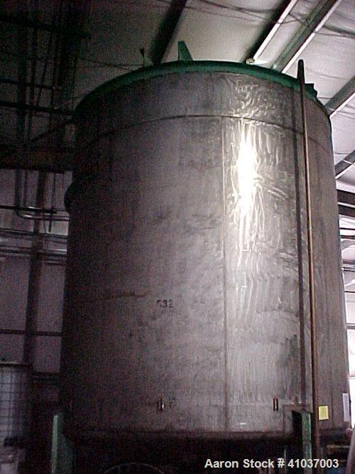 Used Tank, 9,500 Gallon, 316 Stainless Steel, Vertical. 11' dia x 12' 4" Straight Side. Includes aPhiladelphia Mixer;Model – MT-03PTO, 3 HP / 28 RPM, Serial #217913 – 2, Dual SS steel mixer blade and...