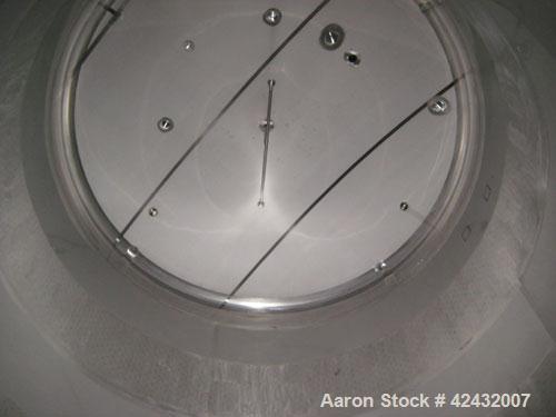 Used Tank, Price-Schonstrom, 16,500  gallon, stainless steel. 12' diameter x 20' high, dished heads, internal rated 20 psi @ 100 deg F, dimple jacket rated 50 psi @ 100 deg F.  Insulated with plastic...