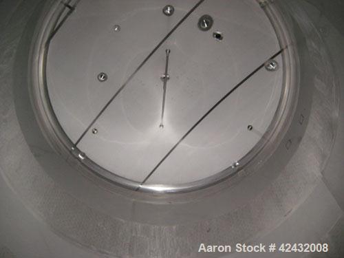 Used Tank, Price-Schonstrom, 16,500  gallon, stainless steel. 12' diameter x 20' high, dished heads, internal rated 20 psi @ 100 deg F, dimple jacket rated 50 psi @ 100 deg F.  Insulated with plastic...
