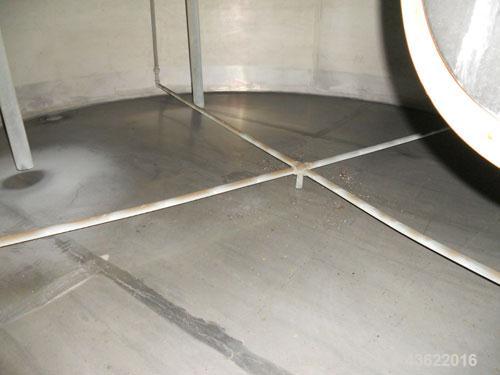Used Krenz Approximately 5,200 Gallon Stainless Steel Storage Tank. Approximately 9' diameter x 11' straight side. Flat bottom and slight cone top. Various top openings including a 17" manway with co...