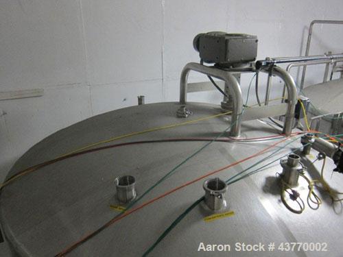 Used 6000 gallon SS Single Shell Dome Top & Bottom Vertical Tank; 112" x 132"; with vertical agitatior, baffle and spray ball; Seismic zone rated legs; Tank #5B.