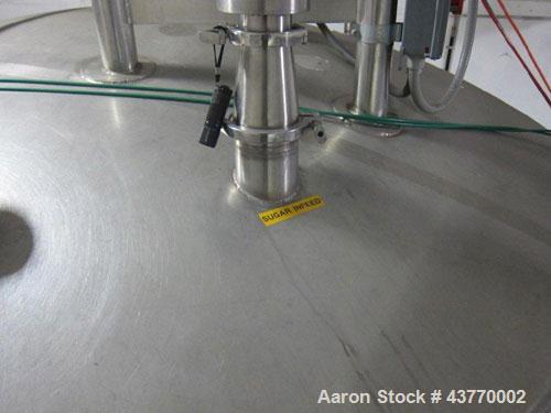 Used 6000 gallon SS Single Shell Dome Top & Bottom Vertical Tank; 112" x 132"; with vertical agitatior, baffle and spray ball; Seismic zone rated legs; Tank #5B.