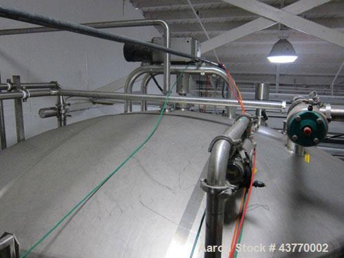 Used 6000 gallon SS Single Shell Dome Top & Bottom Vertical Tank; 112" x 132"; with vertical agitatior, baffle and spray ball; Seismic zone rated legs; Tank #5B.