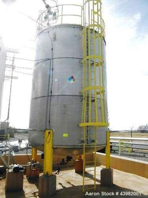 Used Approx. 15,000 Gallon Stainless Steel Storage Tank. Approx. 11' 6" Diameter x 18' Straight Side. Dish Bottom and Slight Cone Top. Mounted on 4 Carbon Steel I-Beam Legs. Center Bottom Outlet.