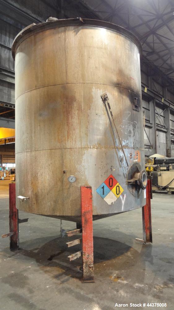 Used Tank, 5000 Gallon, 316 Stainless Steel, Vertical. Approximate 108" diameter x 126" straight side, flat top, coned bottom. Fixed carbon steel agitator bridge, approximate 1/5 top opening with cov...
