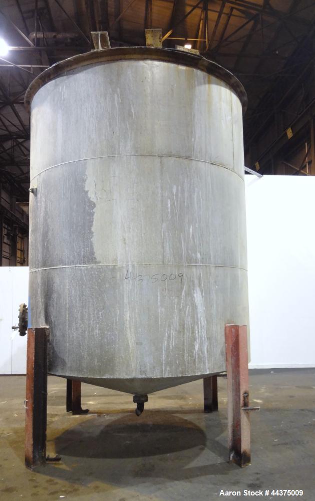 Used Tank, 5000 Gallon, 316 Stainless Steel, Vertical. Approximate 108" diameter x 126" straight side, flat top, coned bottom. Fixed carbon steel agitator bridge, approximate 1/5 top opening with cov...