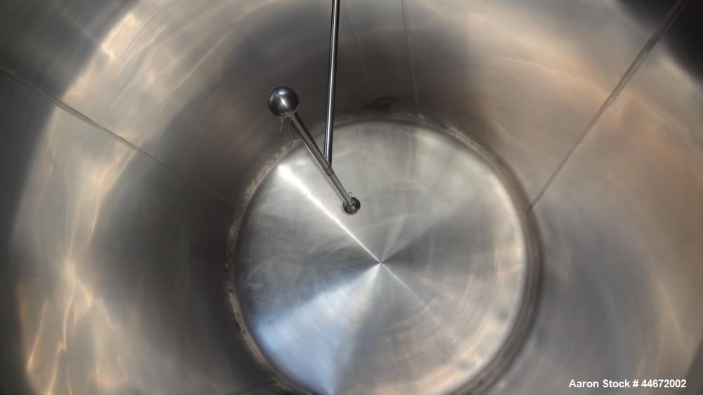 Used Storage Tank, 5000 Gallon, 304 Stainless Steel, Horizontal. Approximate 96" diameter x 144" straight side, dished heads. Insulated with carbon steel sheathing. (2) Spray balls. 16" x 20" Oval ma...
