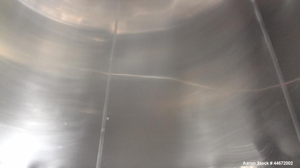 Used Storage Tank, 5000 Gallon, 304 Stainless Steel, Horizontal. Approximate 96" diameter x 144" straight side, dished heads. Insulated with carbon steel sheathing. (2) Spray balls. 16" x 20" Oval ma...