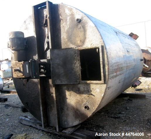 Used Tank, 6200 Gallon, 304 Stainless Steel, Vertical. 108” Diameter x 156” straight side, flat top, coned bottom. Top entering agitator with a shaft and (2) (6) blade turbines, driven by a 7.5hp mot...