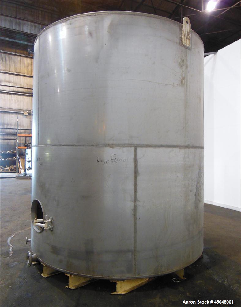 Used Tank, 5,000 Gallon, 304 Stainless Steel, Vertical. Approximate 112" x 120" straight side, slight coned top, flat bottom. Openings top (2) 3", side 3", 17" x 20" oval man way with cover, 3" side ...