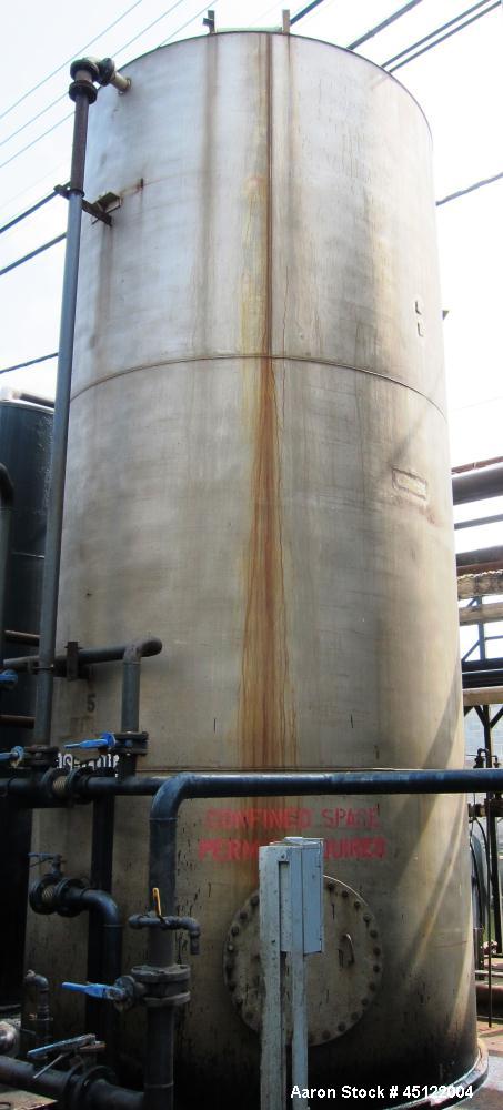 Used 11,500 Gallon Stainless Steel Storage Tank, 9'6" diameter, 22' tall, flat top, flat bottom, side entering manway.