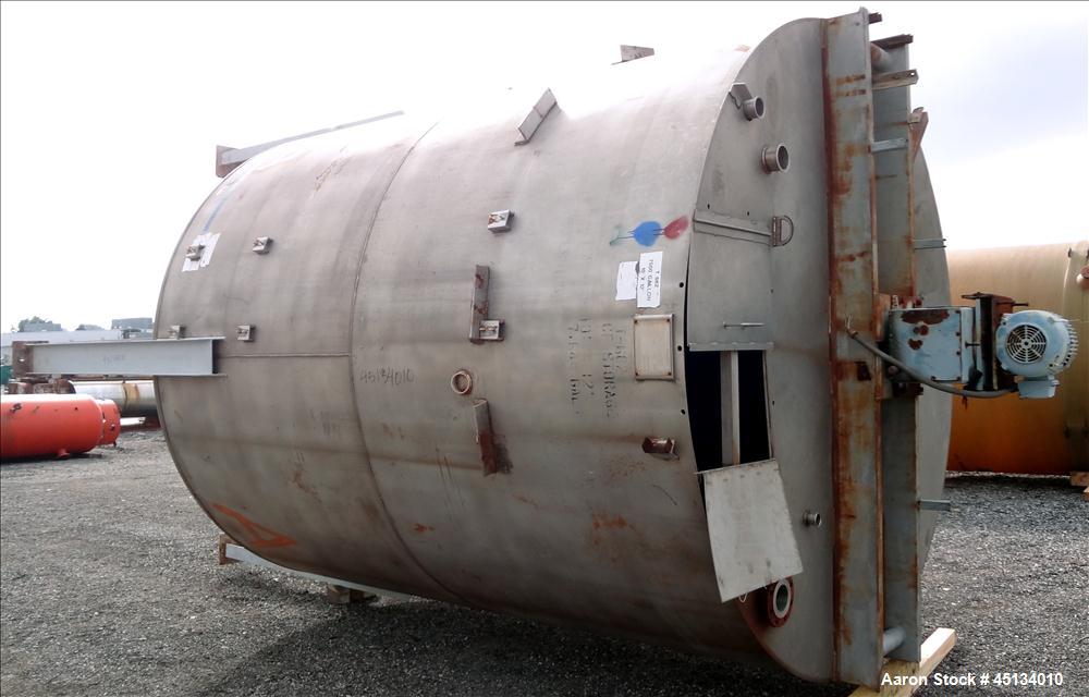 Used BMT Brown Minneapolis Tank, 7,500 Gallons, 304 Stainless Steel, Approximate 142" Straight Side x 120" Diameter, Flat Top, Dish Bottom. Openings: Top, 2", 3", (2) 4", 3" center bottom outlet. (4)...