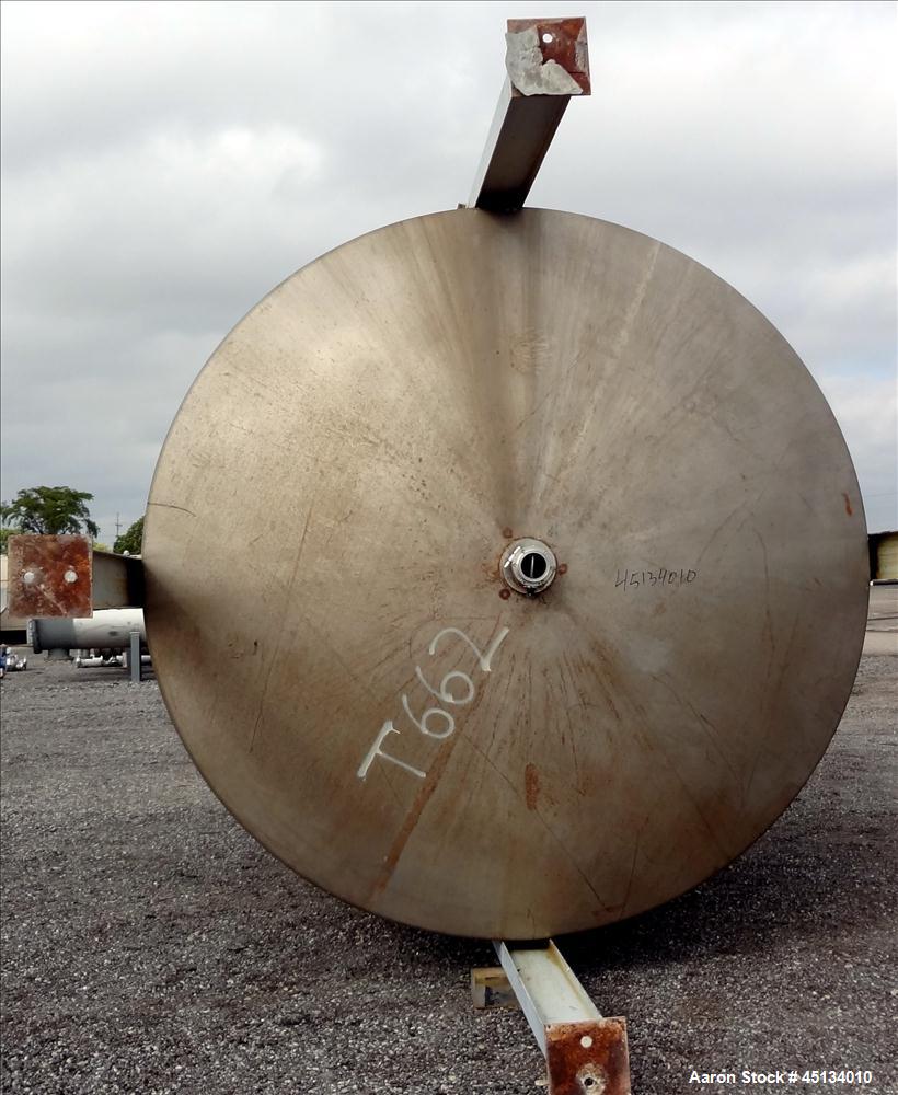 Used BMT Brown Minneapolis Tank, 7,500 Gallons, 304 Stainless Steel, Approximate 142" Straight Side x 120" Diameter, Flat Top, Dish Bottom. Openings: Top, 2", 3", (2) 4", 3" center bottom outlet. (4)...
