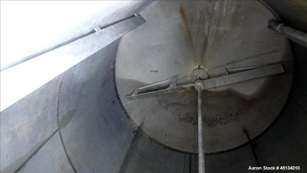 Used BMT Brown Minneapolis Tank, 7,500 Gallons, 304 Stainless Steel, Approximate 142" Straight Side x 120" Diameter, Flat Top, Dish Bottom. Openings: Top, 2", 3", (2) 4", 3" center bottom outlet. (4)...