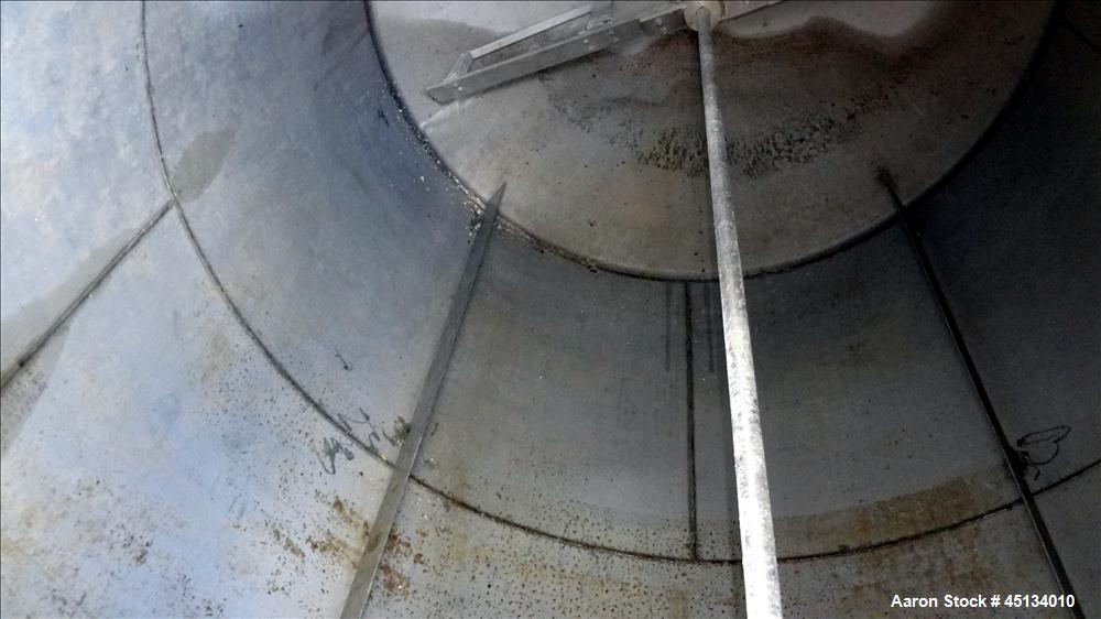 Used BMT Brown Minneapolis Tank, 7,500 Gallons, 304 Stainless Steel, Approximate 142" Straight Side x 120" Diameter, Flat Top, Dish Bottom. Openings: Top, 2", 3", (2) 4", 3" center bottom outlet. (4)...