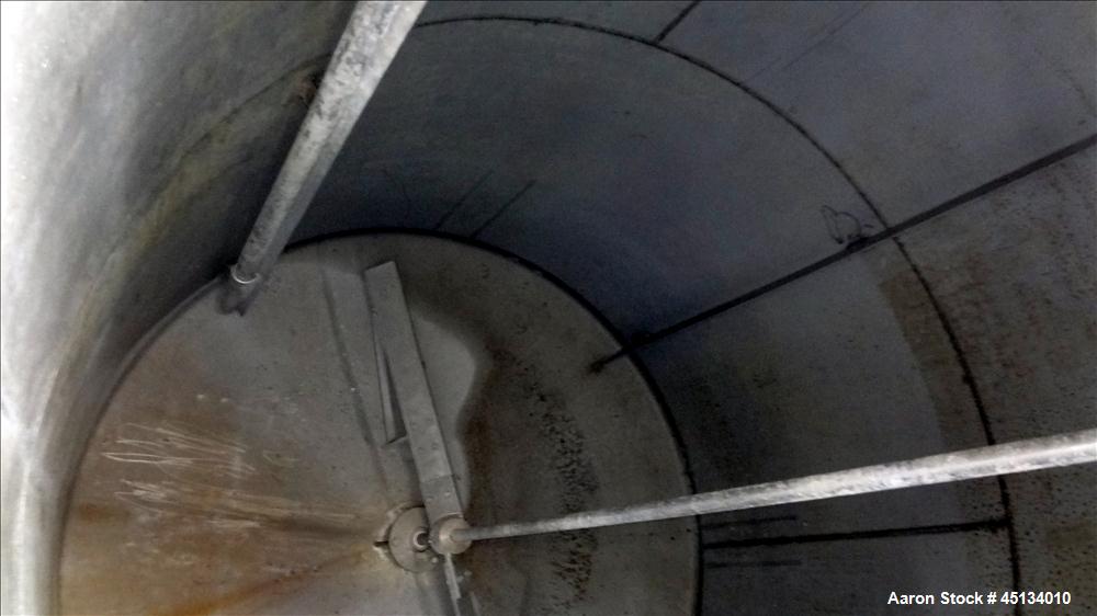 Used BMT Brown Minneapolis Tank, 7,500 Gallons, 304 Stainless Steel, Approximate 142" Straight Side x 120" Diameter, Flat Top, Dish Bottom. Openings: Top, 2", 3", (2) 4", 3" center bottom outlet. (4)...
