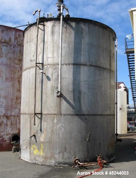 Used - Tank, 20,000 Gallon, 14' diameter x 18' high on straight side. Vertical, Constructed T304 Stainless steel, Flat bottom, Cone top, manhole on side near bottom and top.