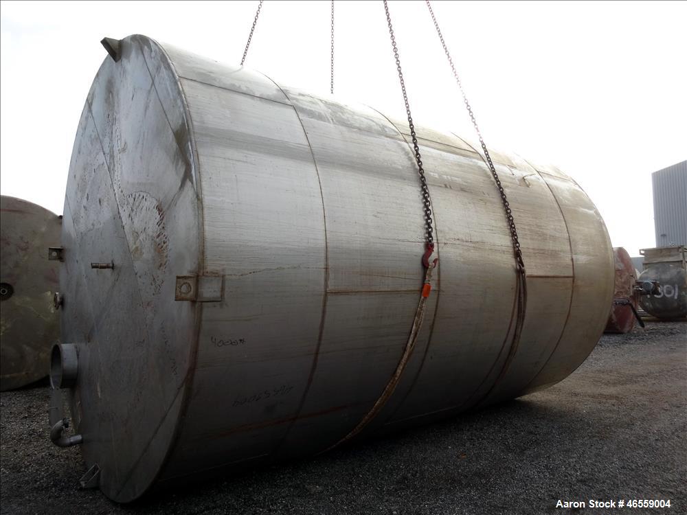 Used Tank, approximate 18,000 Gallon, Approximate 150" Diameter x 226" to 228" Straight Side, 316 Stainless Steel, Vertical, Flat Top, sloped bottom, Single Shell Bulk. Top Inlets,18" manway no cover...
