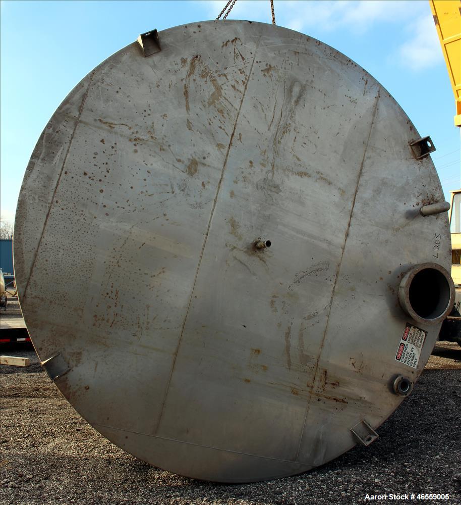 Used Tank, 15,000 Gallon, 316 Stainless Steel, Vertical. Approximate 148" diameter x 228" straight side. Flat top, flat bottom. Openings top: 17-1/2" manway no cover, 3", 2", 3" vent. Approximate 3" ...