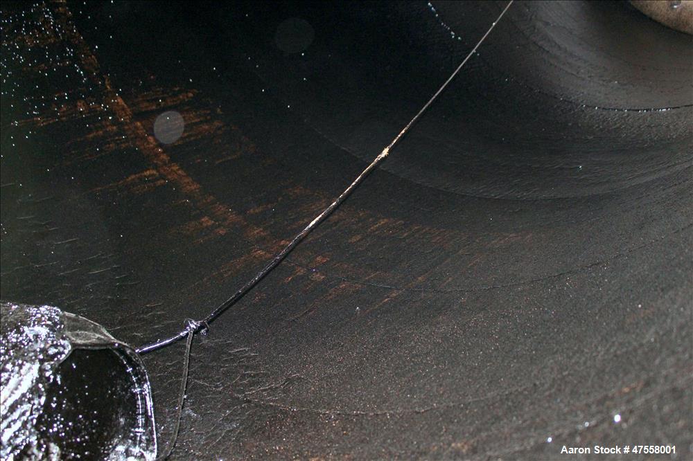 Used Insulated Tank, Approximate 10,000 Gallon, 304 Stainless Steel, Vertical.