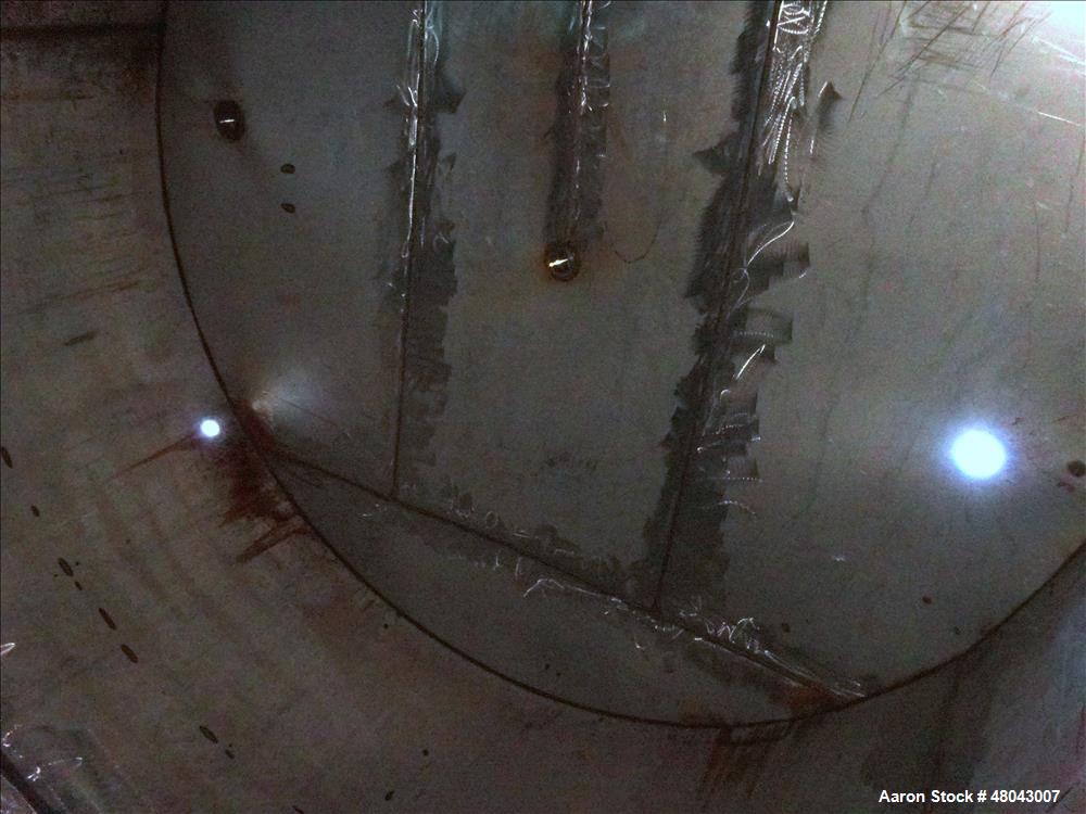 Used Storage Tank, Approximate 8,400 Gallon, 304 Stainless Steel, Vertical.