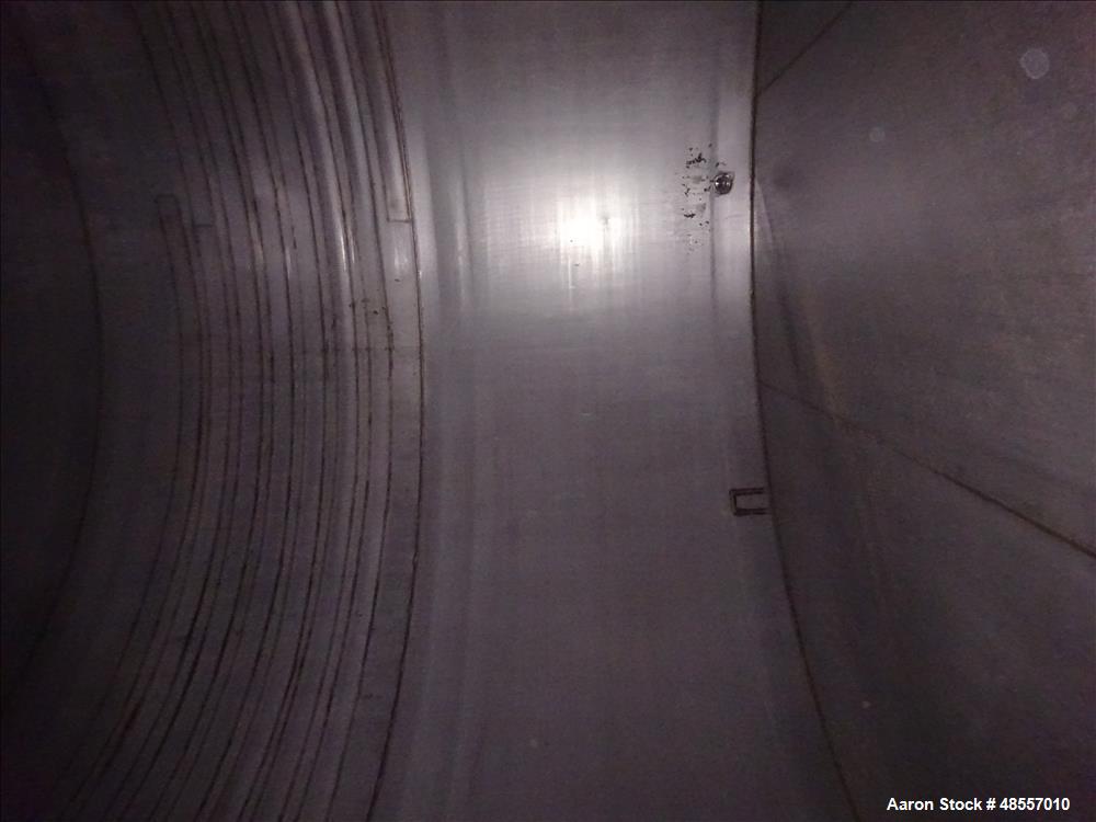 Used Tank, Approximately 25,000 Gallon, 304 Stainless Steel, Vertical.