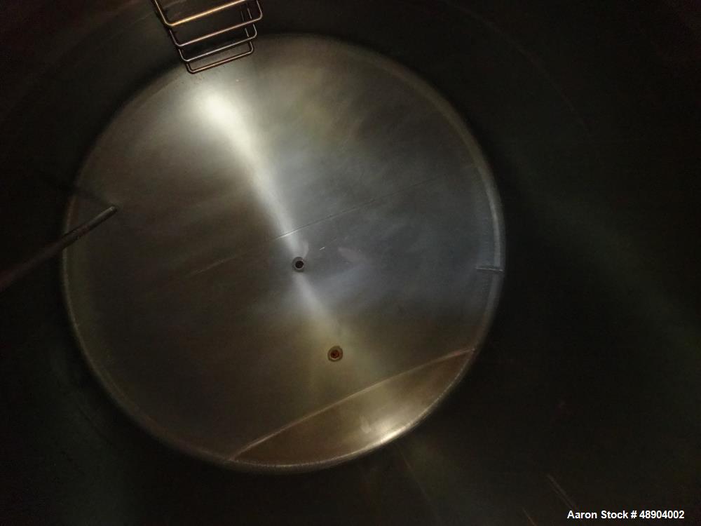 Used Single Wall Tank, Approximate 5000 Gallon, Stainless Steel, Vertical.