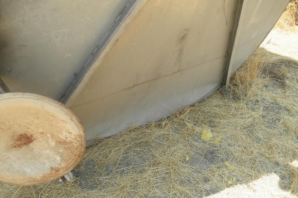 Used Tank, Approximate 12,000 Gallon, Stainless Steel tank, Vertical. Approximately 11' diameter x 16' straight side, cone top with 2” diameter center top opening, 20” diameter top manway and 4” diam...