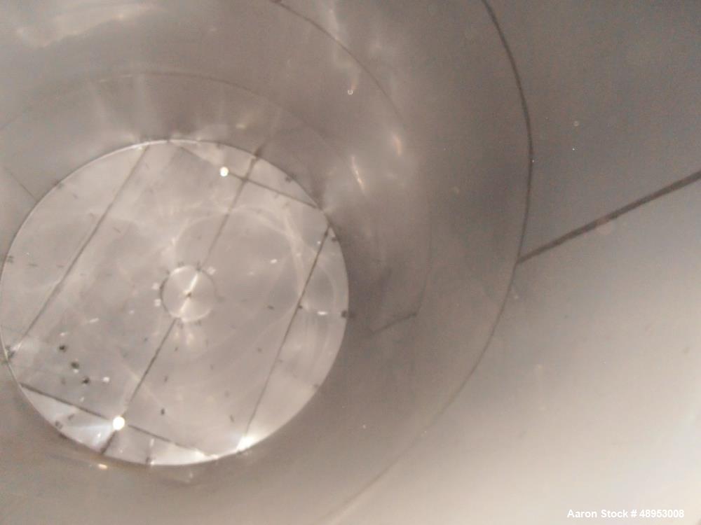 Used Tank, 17,000 Gallon, Stainless Steel, Vertical. Approximate 12' diameter x 20' straight side. Includes cone top with slight sloped bottom to 3" diameter side bottom outlet, 16" x 20" oval side b...