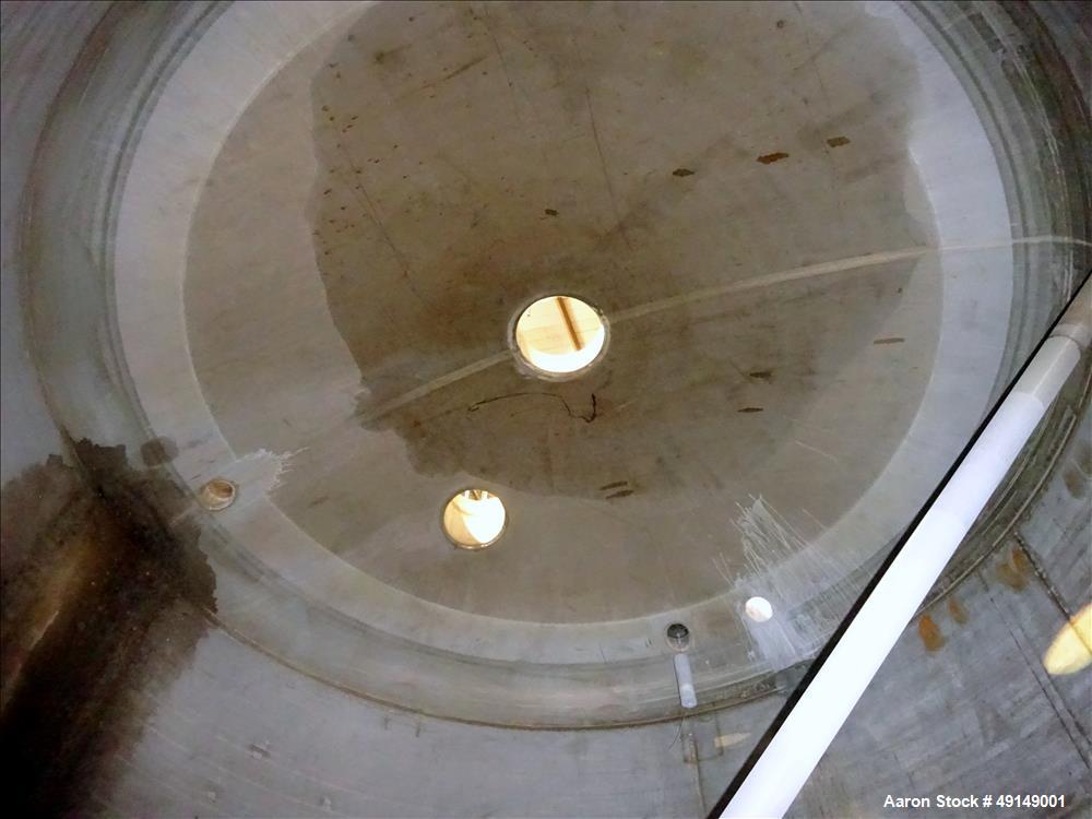 Used Tank, Approximate 7,000 Gallon, 304 Stainless Steel, Vertical. Approximate