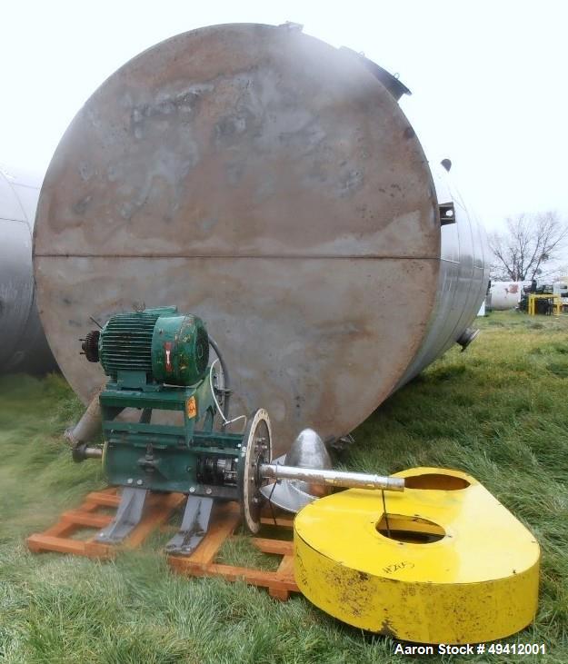 Used Tank, 15,500 Gallon, Stainless Steel, Vertical. Approximate 11-1/2' diameter x 20' high, cone top, flat bottom. Side Entering Prochem Model 33MDSL-60S side bottom agitator, driven by a 25hp, 3/6...
